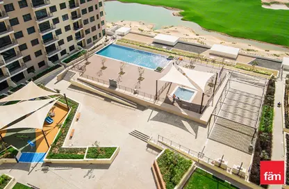 Outdoor Building image for: Apartment - 2 Bedrooms - 3 Bathrooms for sale in Golf Views - EMAAR South - Dubai South (Dubai World Central) - Dubai, Image 1
