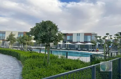 Pool image for: Villa - 3 Bedrooms - 4 Bathrooms for rent in Cherrywoods - Dubai Land - Dubai, Image 1