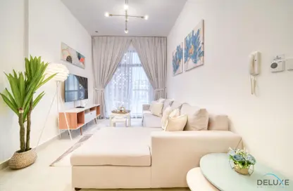 Living Room image for: Apartment - 1 Bedroom - 1 Bathroom for rent in Binghatti Mirage - Jumeirah Village Circle - Dubai, Image 1