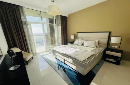 Room / Bedroom image for: Apartment - 1 Bedroom - 2 Bathrooms for rent in Tower 108 - Jumeirah Village Circle - Dubai, Image 1