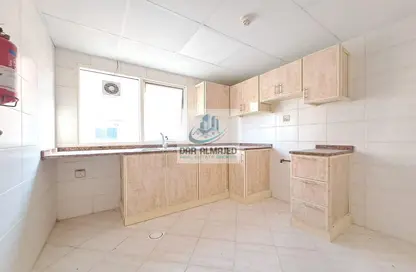 Kitchen image for: Apartment - 2 Bedrooms - 2 Bathrooms for rent in Street 20 - Al Nahda - Sharjah, Image 1