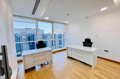 Office Space - Studio - 4 Bathrooms for rent in Hamdan Street - Abu Dhabi
