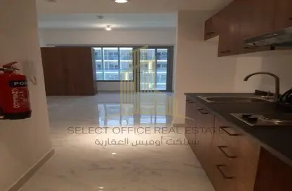 Kitchen image for: Apartment - 1 Bathroom for sale in Oasis 1 - Oasis Residences - Masdar City - Abu Dhabi, Image 1