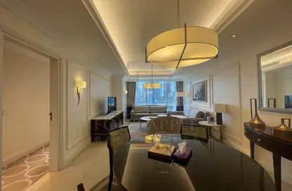 Living / Dining Room image for: Apartment - 1 Bedroom - 2 Bathrooms for sale in Kempinski BLVD - Downtown Dubai - Dubai, Image 1