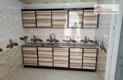 Kitchen image for: Apartment - 1 Bathroom for rent in Al Wahda Street - Al Wahda - Abu Dhabi, Image 1