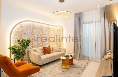 صورة لـ غرفة المعيشة شقة - غرفة نوم - 2 حمامات للبيع في برج العافية الهادئ من WELLCUBE - مثلث قرية الجميرا - دبي ، صورة رقم 1