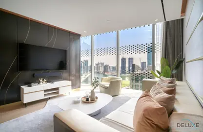 صورة لـ غرفة المعيشة شقة - غرفة نوم - 1 حمام للايجار في برج أوبوس - الخليج التجاري - دبي ، صورة رقم 1