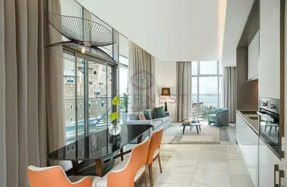Living / Dining Room image for: Apartment - 2 Bedrooms - 3 Bathrooms for rent in Th8 Palm Hotel Apartments - Palm Jumeirah - Dubai, Image 1