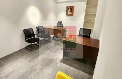 مركز أعمال - استوديو - 4 حمامات للايجار في شارع المطار - منطقة طريق المطار - منطقة القرهود - دبي