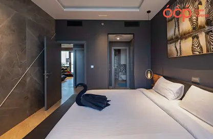 Room / Bedroom image for: Apartment - 1 Bedroom for rent in Ocean Heights - Dubai Marina - Dubai, Image 1