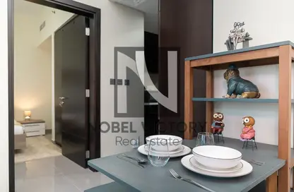 Dining Room image for: Apartment - 1 Bedroom - 2 Bathrooms for sale in Merano Tower - Business Bay - Dubai, Image 1