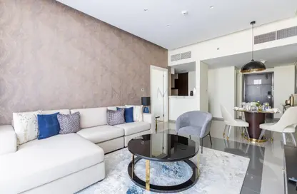 Living / Dining Room image for: Apartment - 1 Bedroom - 2 Bathrooms for rent in DAMAC Majestine - Business Bay - Dubai, Image 1