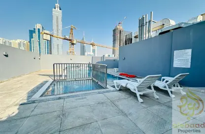 Apartment - 1 Bedroom - 2 Bathrooms for rent in Jumeirah Garden City - Al Satwa - Dubai