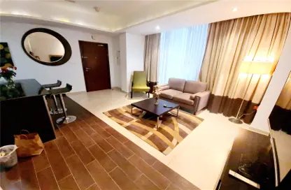 Living Room image for: Apartment - 1 Bedroom - 2 Bathrooms for rent in The Matrix - Dubai Sports City - Dubai, Image 1