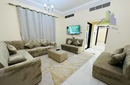 Living Room image for: Apartment - 2 Bedrooms - 2 Bathrooms for rent in Al Jawhara Building - Al Rawda 3 - Al Rawda - Ajman, Image 1