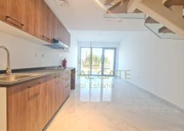 Kitchen image for: Duplex - 2 bedrooms - 2 bathrooms for sale in Oasis 1 - Oasis Residences - Masdar City - Abu Dhabi, Image 1