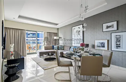 Living / Dining Room image for: Apartment - 1 Bedroom - 1 Bathroom for rent in DAMAC Towers by Paramount - Business Bay - Dubai, Image 1