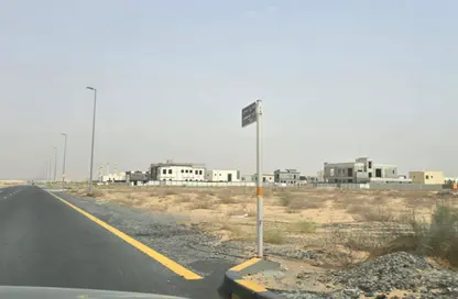 أرض - استوديو للبيع في روضة القرط - ضاحية الروضات - الشارقة
