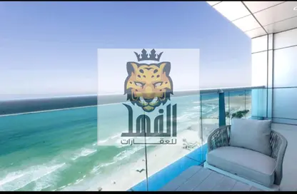 Apartment - 1 Bedroom - 2 Bathrooms for sale in Corniche Tower - Ajman Corniche Road - Ajman