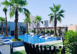 صورةحوض سباحة لـ: شقة - 1 غرفة نوم - 2 حمامات للبيع في شيماء افنيو ريديسينس - قرية الجميرا سركل - دبي, صورة 1