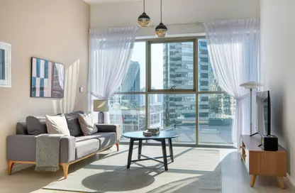 صورة لـ غرفة المعيشة شقة - غرفة نوم - 2 حمامات للايجار في بلفيو برج 2 - أبراج بلفيو - دبي وسط المدينة - دبي ، صورة رقم 1