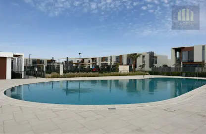 Pool image for: Townhouse - 3 Bedrooms - 4 Bathrooms for rent in Cherrywoods - Dubai Land - Dubai, Image 1