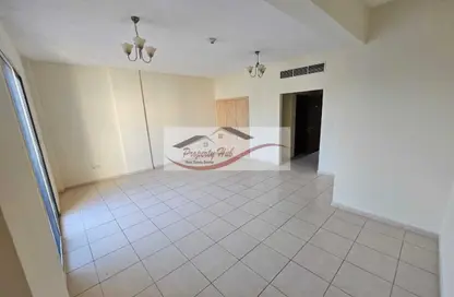 Apartment - Studio - 1 Bathroom for rent in IC1-EMR-06 - Emirates Cluster - International City - Dubai