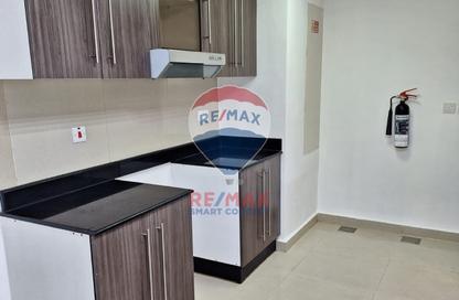 Apartment - 2 Bedrooms - 2 Bathrooms for sale in Tower 19 - Al Reef Downtown - Al Reef - Abu Dhabi