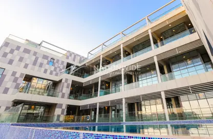 Outdoor Building image for: Duplex - 4 Bedrooms - 5 Bathrooms for sale in Al Raha Lofts - Al Raha Beach - Abu Dhabi, Image 1