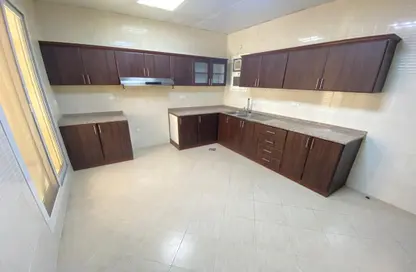 Kitchen image for: Apartment - 1 Bedroom - 2 Bathrooms for rent in Khalifa City - Abu Dhabi, Image 1