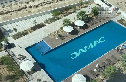 Pool image for: Apartment - 2 Bedrooms - 2 Bathrooms for sale in Artesia B - Artesia - DAMAC Hills - Dubai, Image 1