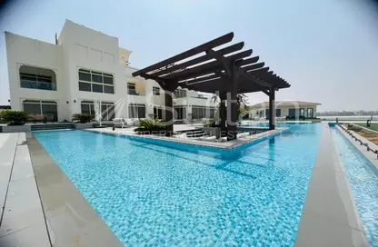 Pool image for: Villa - 5 Bedrooms for sale in The Townhouses at Al Hamra Village - Al Hamra Village - Ras Al Khaimah, Image 1