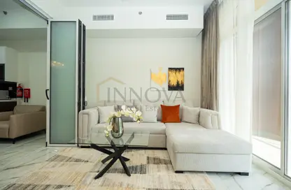 Living Room image for: Apartment - 1 Bedroom - 2 Bathrooms for rent in Jewelz by Danube - Arjan - Dubai, Image 1
