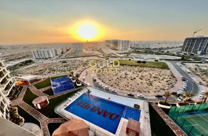 Pool image for: Apartment - 1 Bedroom - 1 Bathroom for rent in Wavez Residence - Liwan - Dubai Land - Dubai, Image 1