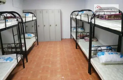 صورة لـ غرفة- غرفة النوم سكن عمال - استوديو للايجار في مصفح الصناعية - مصفح - أبوظبي ، صورة رقم 1