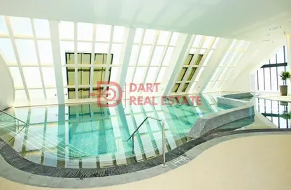 صورة لـ حوض سباحة شقة - 2 غرف نوم - 3 حمامات للايجار في برج محمد بن راشد في المركز التجاري العالمي - شارع الكورنيش - أبوظبي ، صورة رقم 1