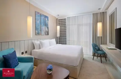صورة لـ غرفة- غرفة النوم النزل و الشقق الفندقية - 1 حمام للايجار في إن إتش كوليكشن دبي ذا بالم - نخلة جميرا - دبي ، صورة رقم 1