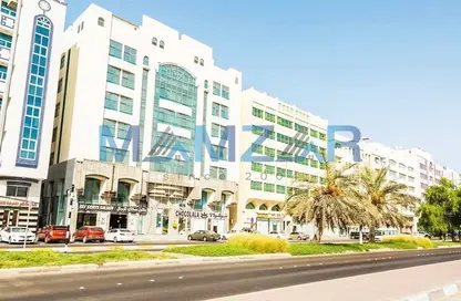 Outdoor Building image for: Whole Building - Studio for sale in Khalidiya Street - Al Khalidiya - Abu Dhabi, Image 1