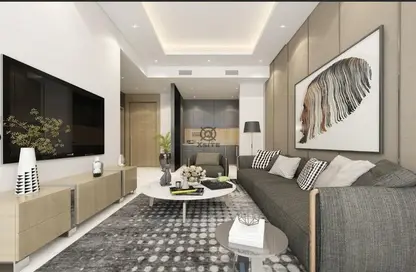Living Room image for: Apartment - 2 Bedrooms - 3 Bathrooms for sale in Cloud Tower - Jumeirah Village Triangle - Dubai, Image 1