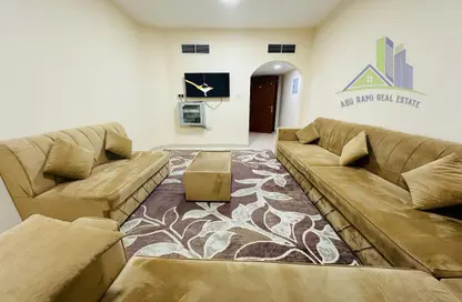 Living Room image for: Apartment - 1 Bedroom - 2 Bathrooms for rent in Rawan Building - Al Naimiya - Al Nuaimiya - Ajman, Image 1