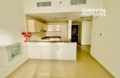 شقة - غرفة نوم - 2 حمامات للايجار في برج يونى استايت الرياضية - مدينة دبي الرياضية - دبي