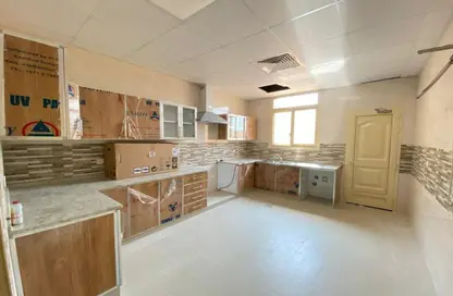 صورة لـ مطبخ فيلا - 7 غرف نوم للايجار في الياسمين - عجمان ، صورة رقم 1