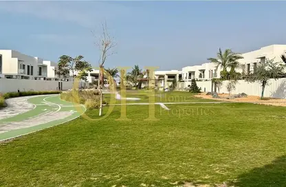 Garden image for: Villa - 4 Bedrooms - 6 Bathrooms for sale in Aspens - Yas Acres - Yas Island - Abu Dhabi, Image 1