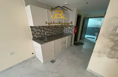 Kitchen image for: Apartment - 1 Bathroom for rent in Al Rumailah building - Al Rumailah 2 - Al Rumaila - Ajman, Image 1