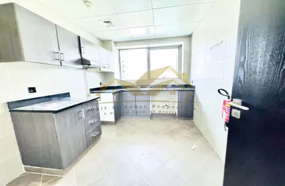 Apartment - 1 Bedroom - 2 Bathrooms for rent in Jumeirah Garden City - Al Satwa - Dubai