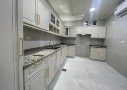 Kitchen image for: Villa - 3 bedrooms - 4 bathrooms for rent in Mohamed Bin Zayed City - Abu Dhabi, Image 1