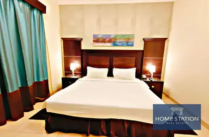 Room / Bedroom image for: Apartment - 2 Bedrooms - 2 Bathrooms for rent in Ivory Grand Hotel Apartments - Al Barsha 1 - Al Barsha - Dubai, Image 1