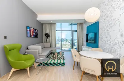 Living / Dining Room image for: Apartment - 1 Bedroom - 2 Bathrooms for rent in Al Sofouh Suites - Al Sufouh 1 - Al Sufouh - Dubai, Image 1