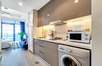 Kitchen image for: Apartment - 1 Bathroom for rent in Farhad Azizi Residence - Al Jaddaf - Dubai, Image 1