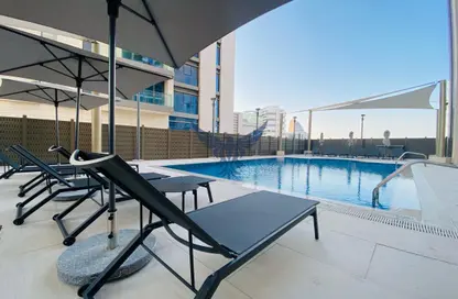 صورة لـ حوض سباحة شقة - 2 غرف نوم - 3 حمامات للايجار في الدانة - شاطئ الراحة - أبوظبي ، صورة رقم 1